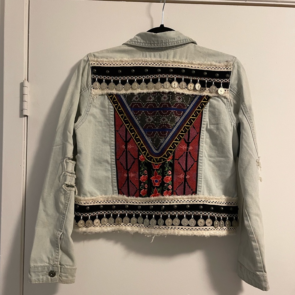Unique denim jacket with beading and detail on back